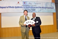 Prof. Joseph Sung (left), Vice-Chancellor and President of CUHK, presents a gift to Dr. Pakishe Aaron Motsoaledi (right), South Africa’s Minister of Health.